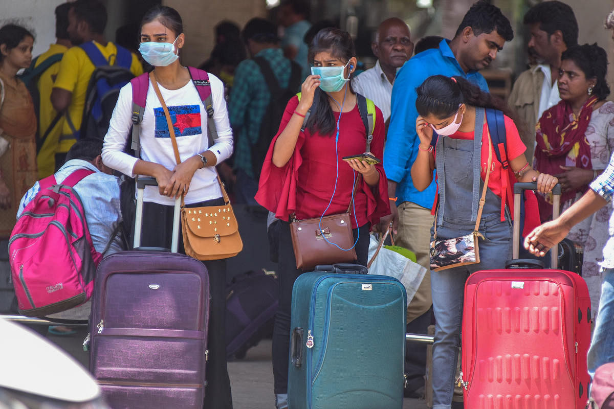 Masks are now common in transit hubs