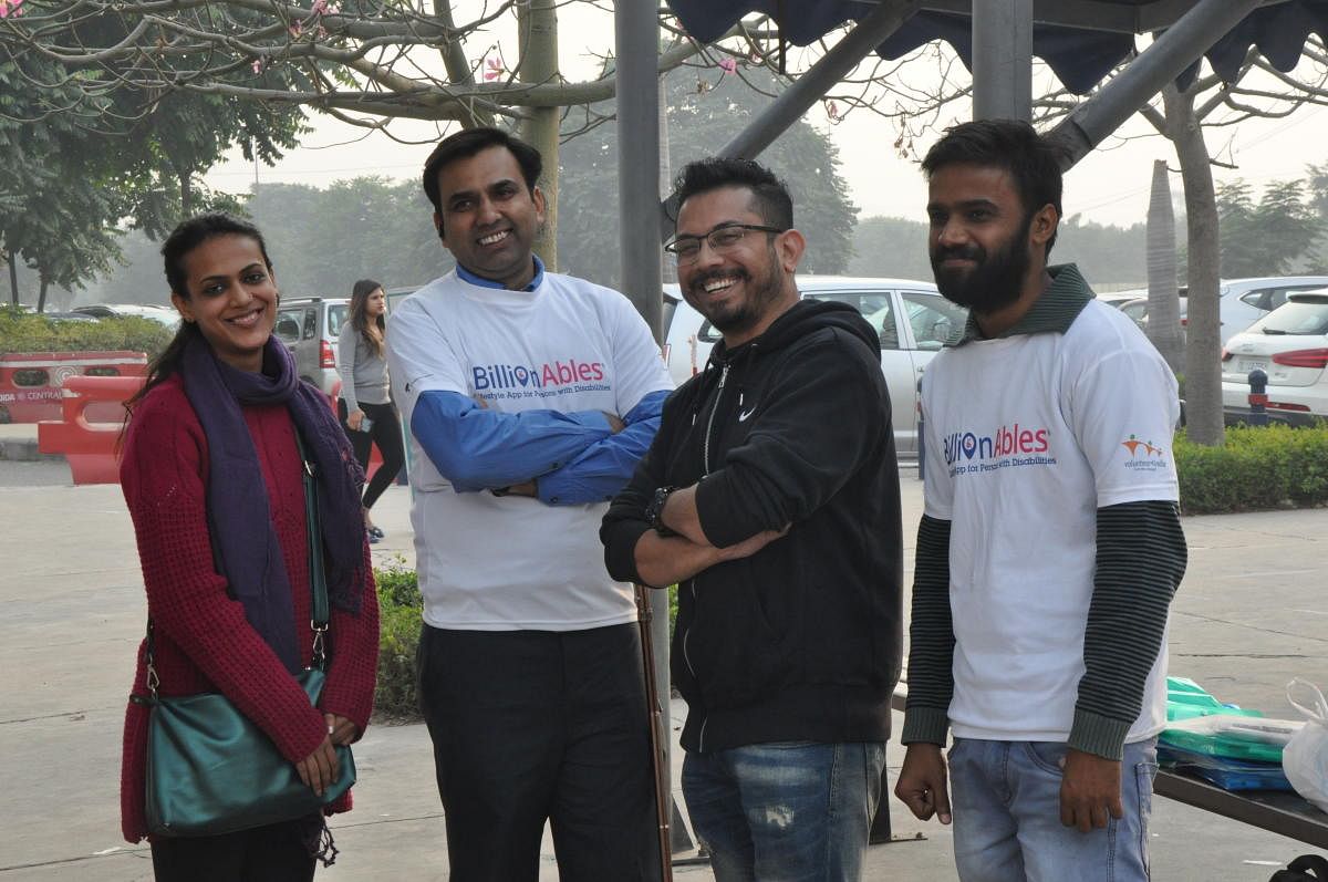 Sameer Garg (second from left) with his team