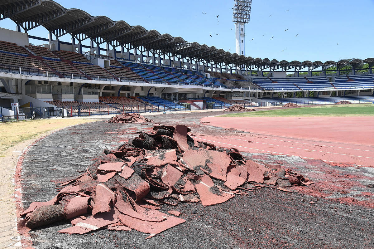 Pictures tell the story: The debris when the work to relay the track began at the Sree Kanteerava Stadium in March 2020. Credit: DH Photo/Pushkar V