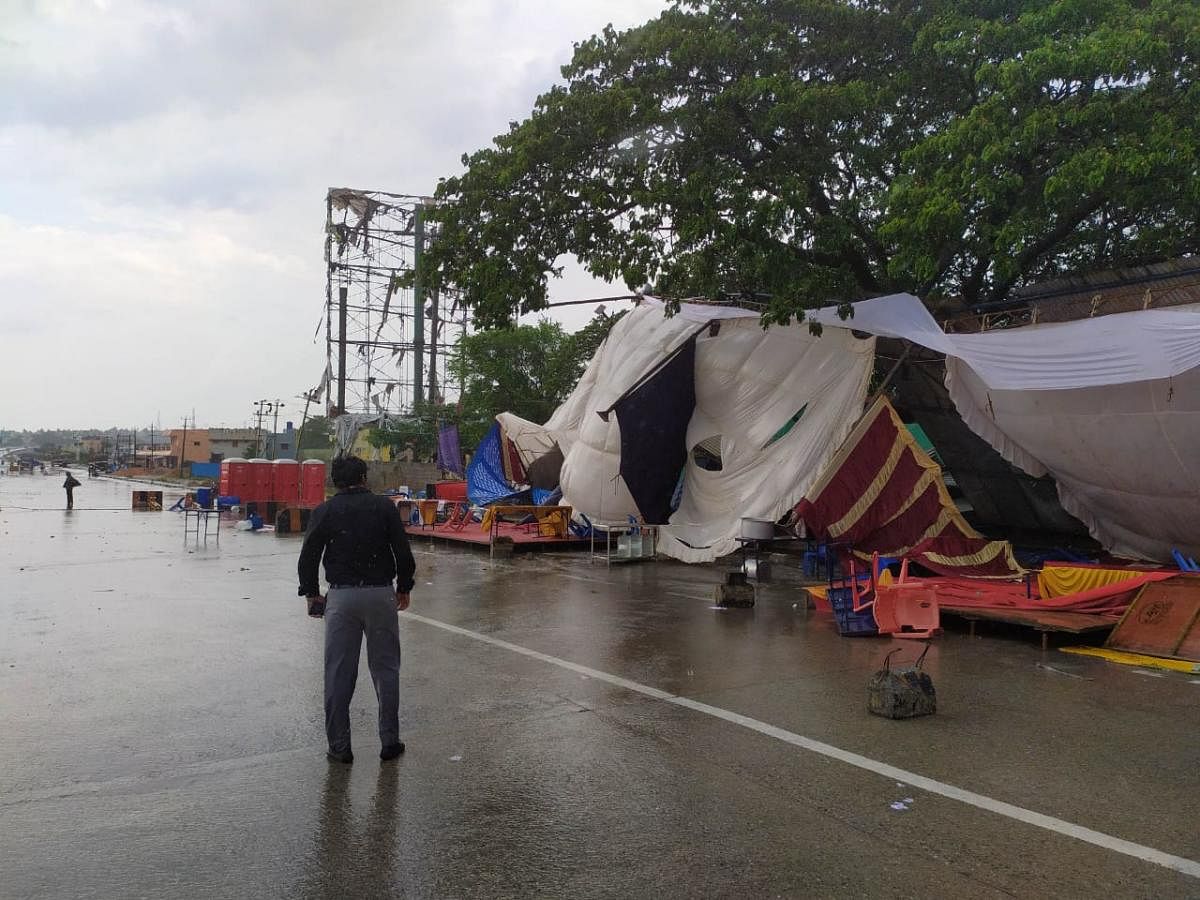 The inter-state travellers' health checkpost at Attibele was brought down following strong wind and heavy rains on Monday. Special arrangement