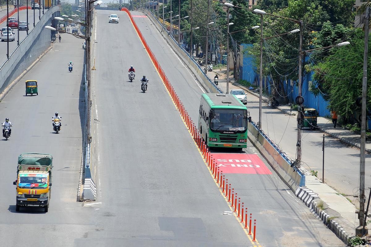 Though the bus lanes were introduced to wean commuters away from personal vehicles, authorities have done little to ensure its success after laying the basic infrastructure. DH FILE/Pushkar V