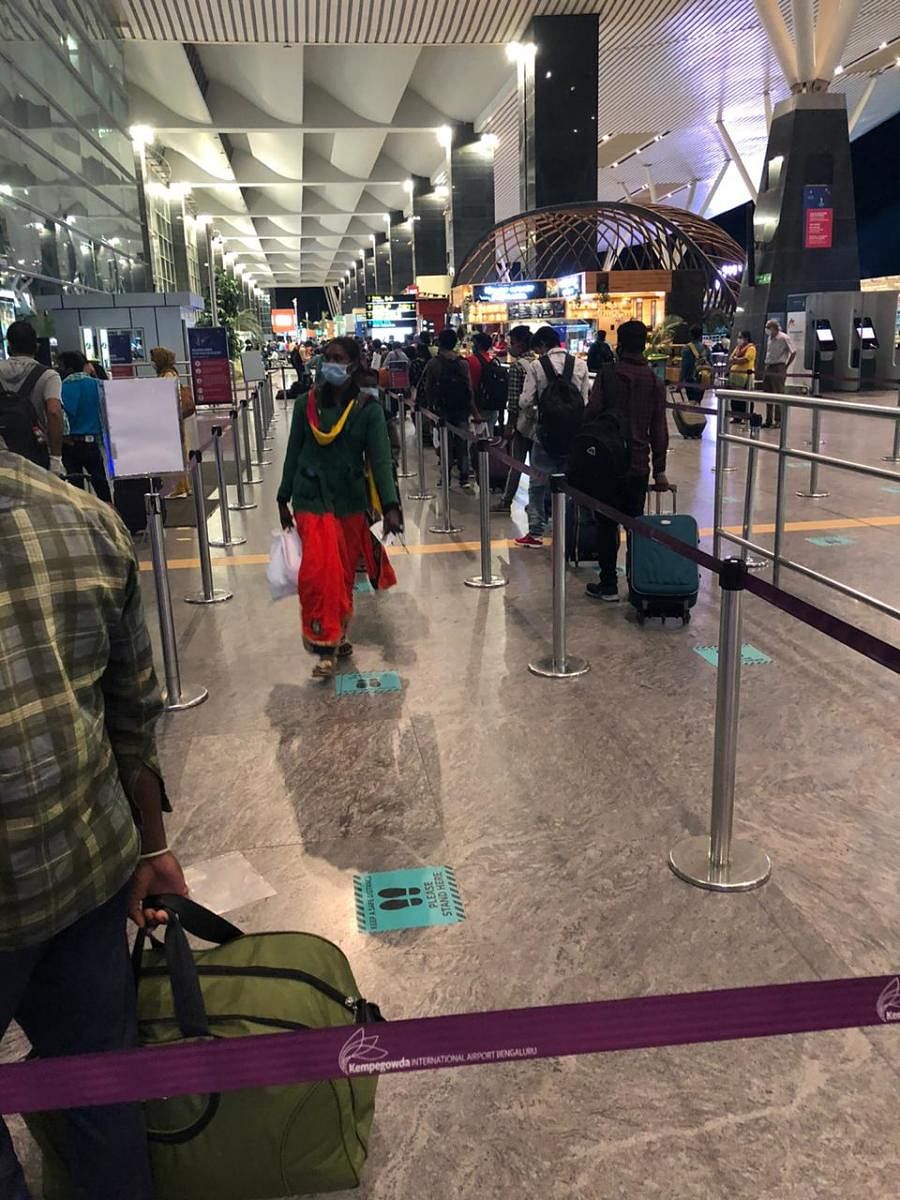 Chattisgarh migrants proceed to check-in at BIAL, for a flight to their home state organised by NLSIU alumnion June 4, 2020.