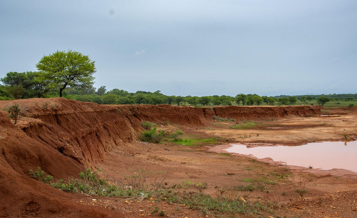 The effects of sand mining: Vertical walls could collapse into the lake during heavy rains, reducing its water-holding capacity. 