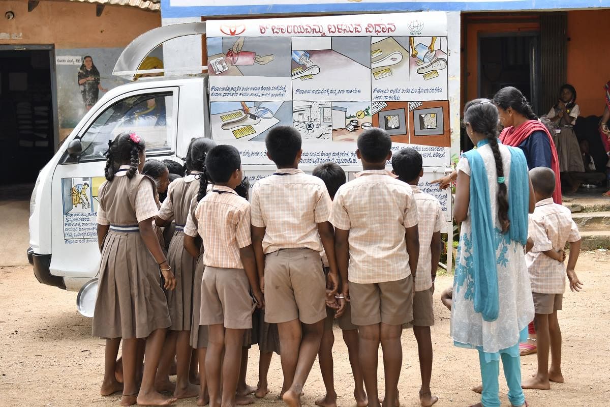 School children being educated about the importance of hygiene and sanitation