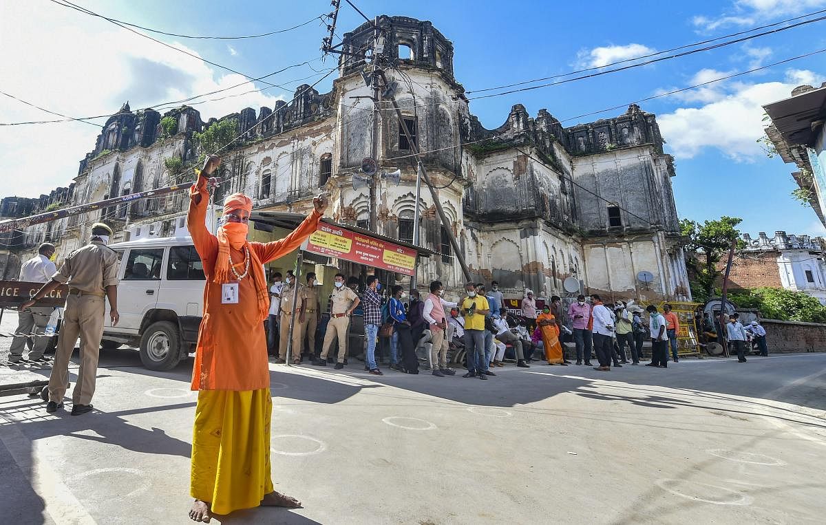 Ayodhya: A sadhu celebrates the ground breaking ceremony for proposed Ram Temple, near Ramjanmabhoomi in Ayodhya. Credit: PTI File Photo