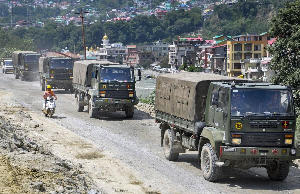 (Inset) Indian Army trucks on the Manali-Leh highway, August 17, 2020.  PTI