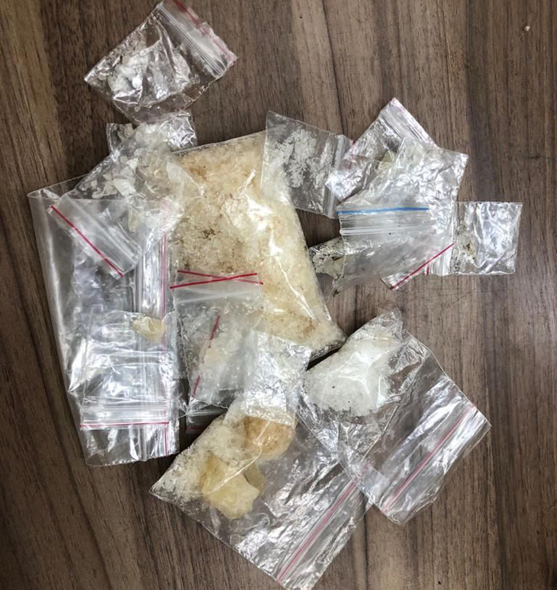 Bovas Shaji and (R) John Erick Asrin were arrested by the Magadi police for possessing drugs. Their two-wheelers and four mobile phones were also confiscated.