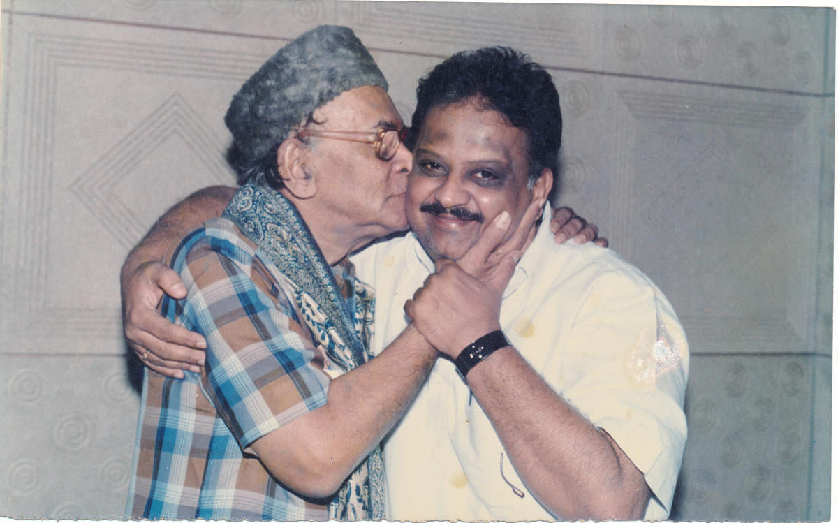 An affectionate moment with P B Sreenivas.