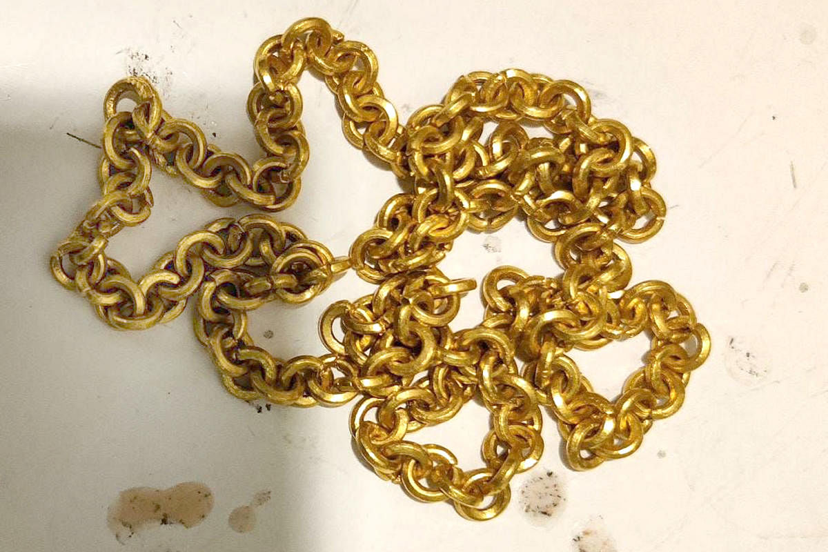 The gold chain seized at the KIA. 