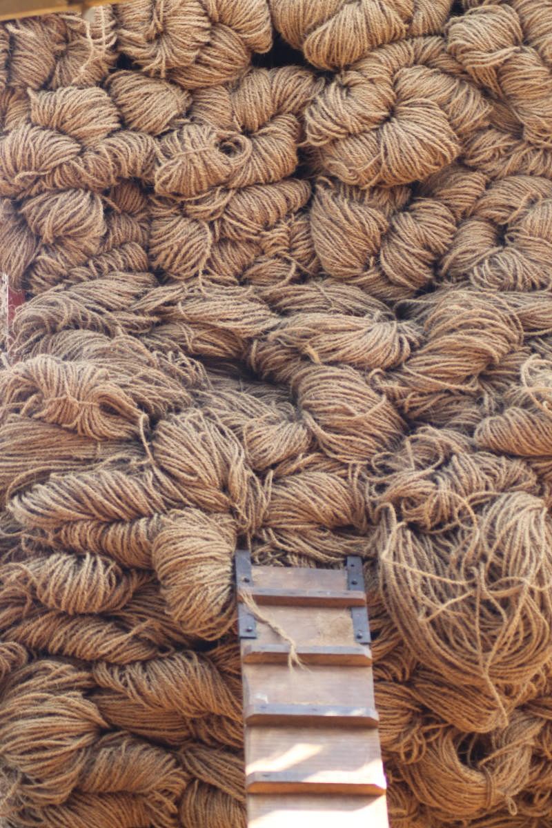 Coir rope being loaded onto the truck 