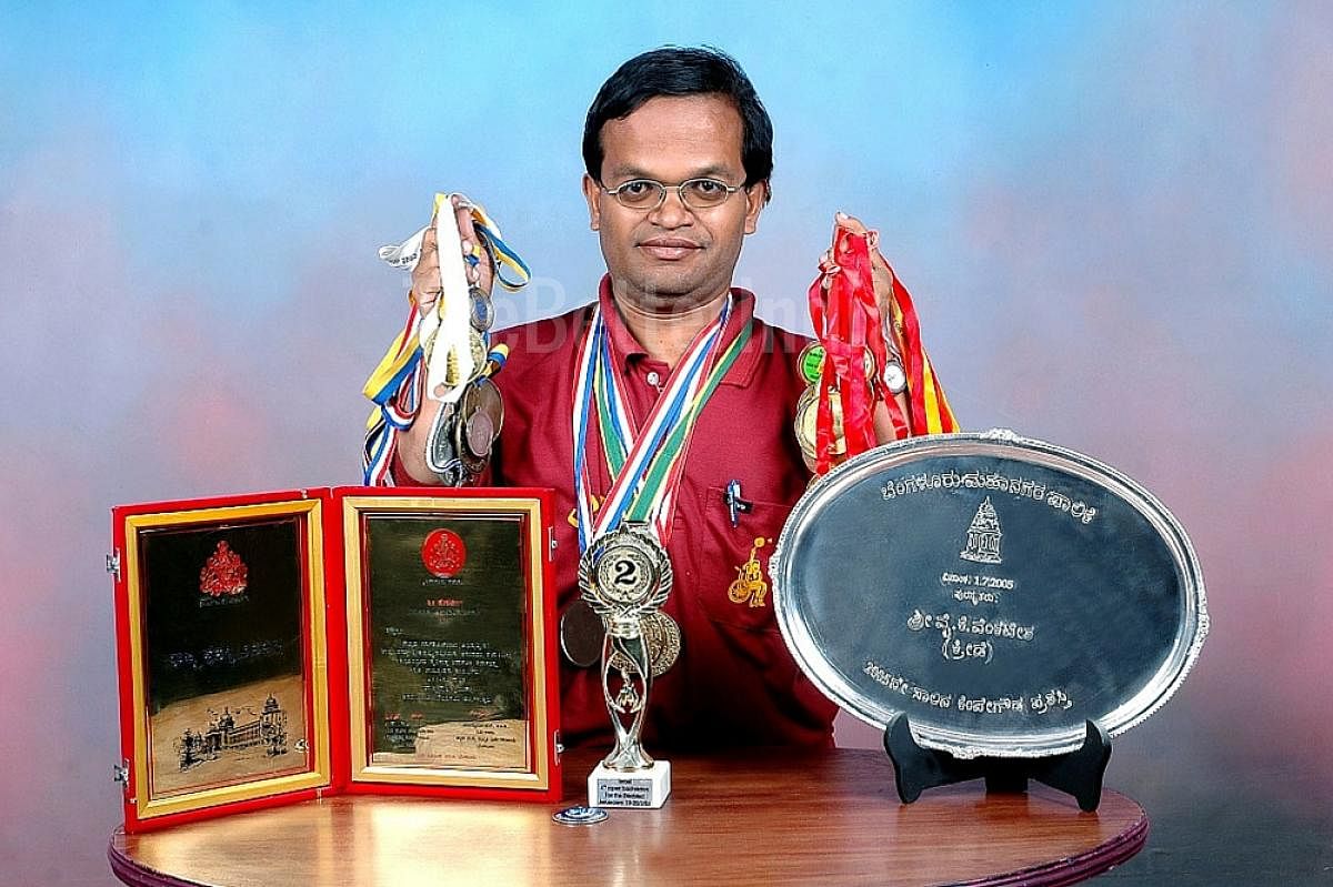 Para-athlete K Y Venkatesh with his medals and awards; (right) receiving the Padma Shri from the President