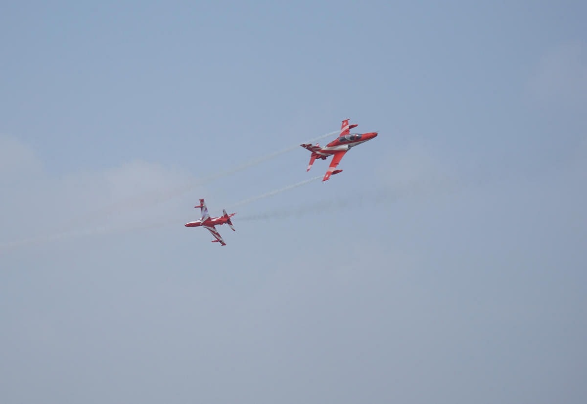 Hawks of the Surya Kiran aerobatics team perform during the Aero India 2021 on Wednesday.