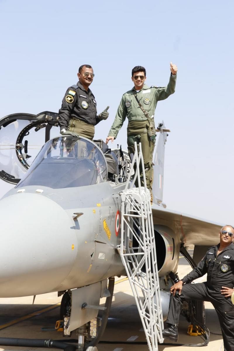 Bangalore South MP Tejasvi Surya gestures before taking off for a 30-minute sortie in LCA Tejas at Yelahanka Air Force Station in Bengaluru on Thursday.