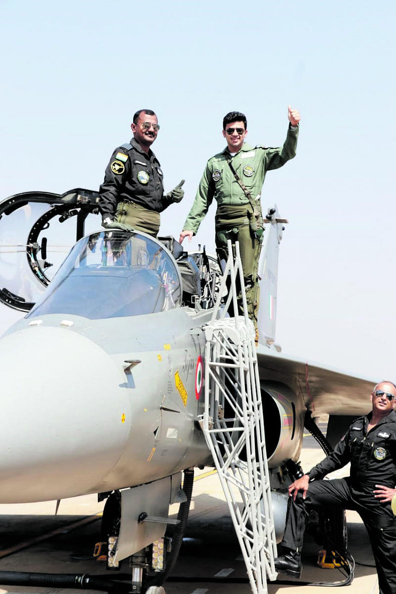 Bangalore South MP Tejasvi Surya gestures before taking off for a 30-minute sortie in LCA Tejas at Yelahanka Air Force Station in Bengaluru on Thursday.