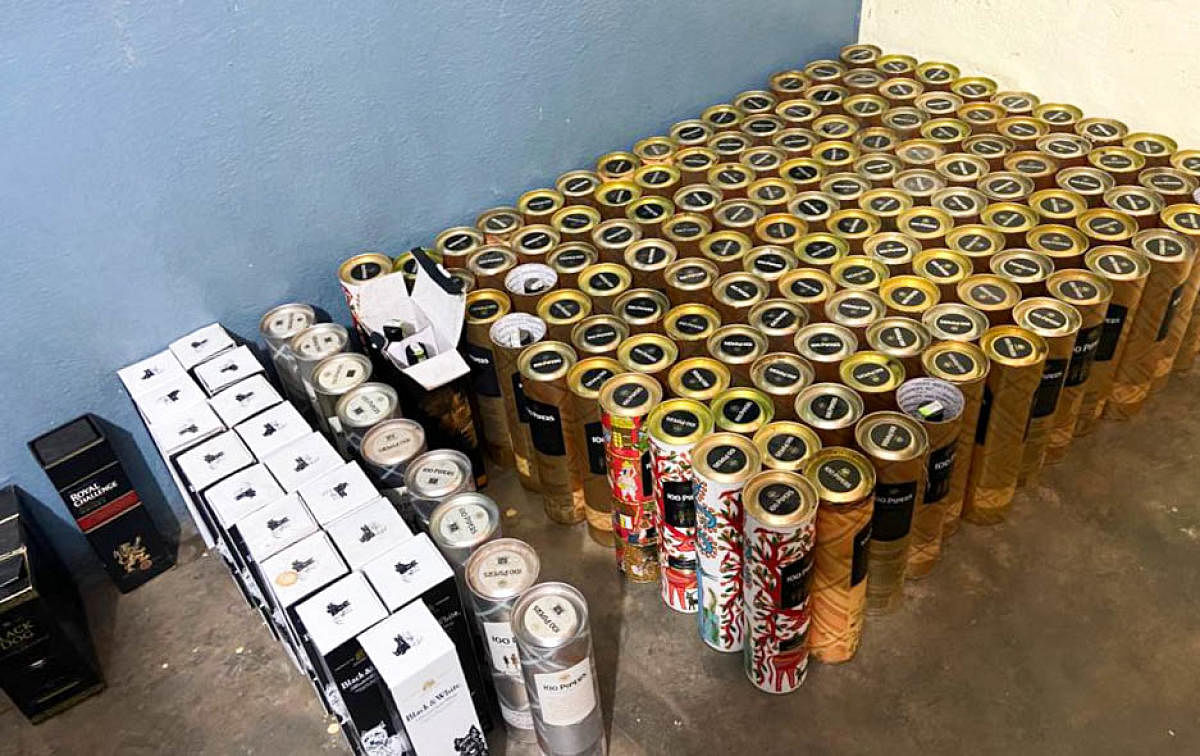 ACB officials seized liquor from the accused's residence. Credit: DH Photo