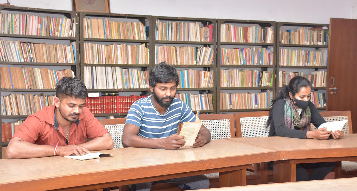 People reading at the library in Dhvanyaloka. PHOTO BY B R SAVITHA