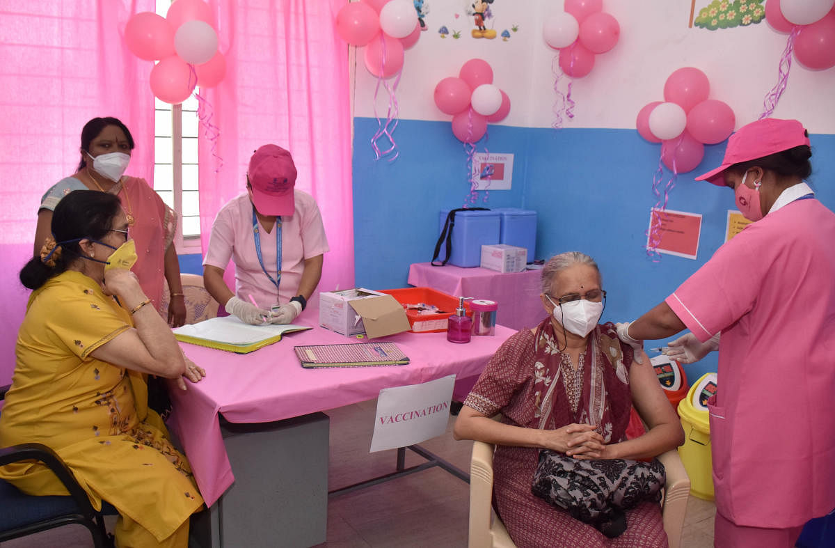 An all-women pink booth was inaugurated at CV Raman Nagar General Hospital. It will be manned by women vaccinators, site supervisors and security personnel.DH PHOTO/Janardhan B K