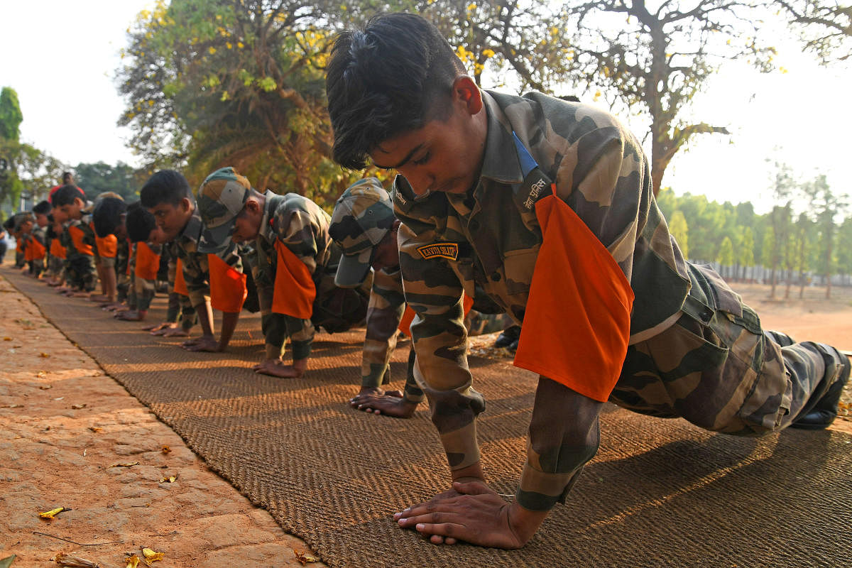 21 are graduates with college degrees and 51 have experience in the military system, having been members of the NCC. Credit: DH Photo/Pushkar V