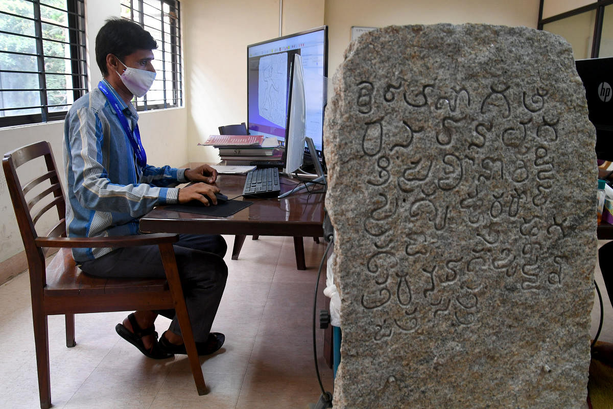 Epigraphists and historians scan the stone records with an advanced hand-held scanner. The scanned images are then processed into 3D models. DH PHOTO/PUSHKAR V
