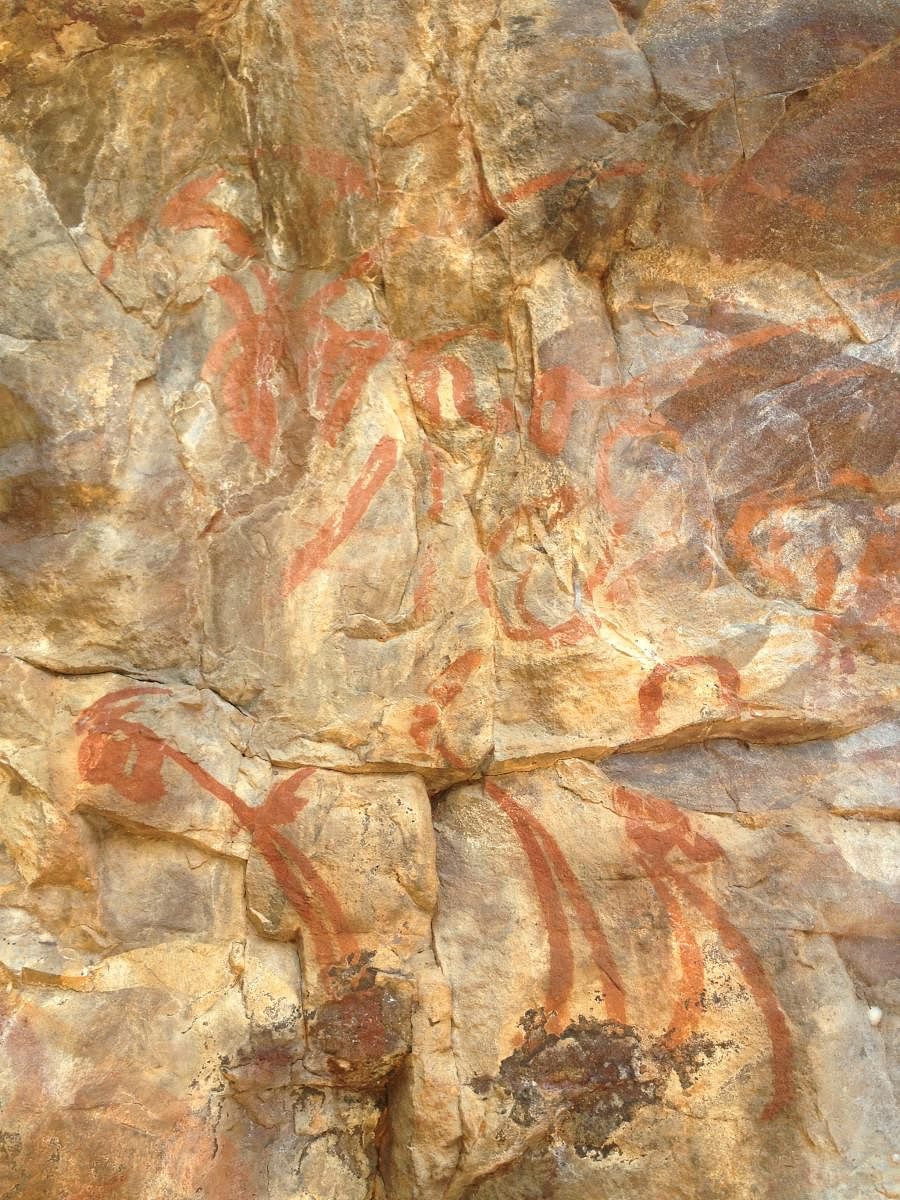 A rock art panel on the cliff behind the Hire Makuteshwara Temple
