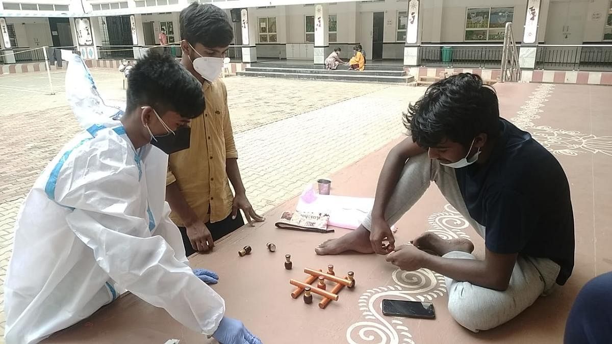 Covid patients play board games at Covid care centres in Bengaluru.