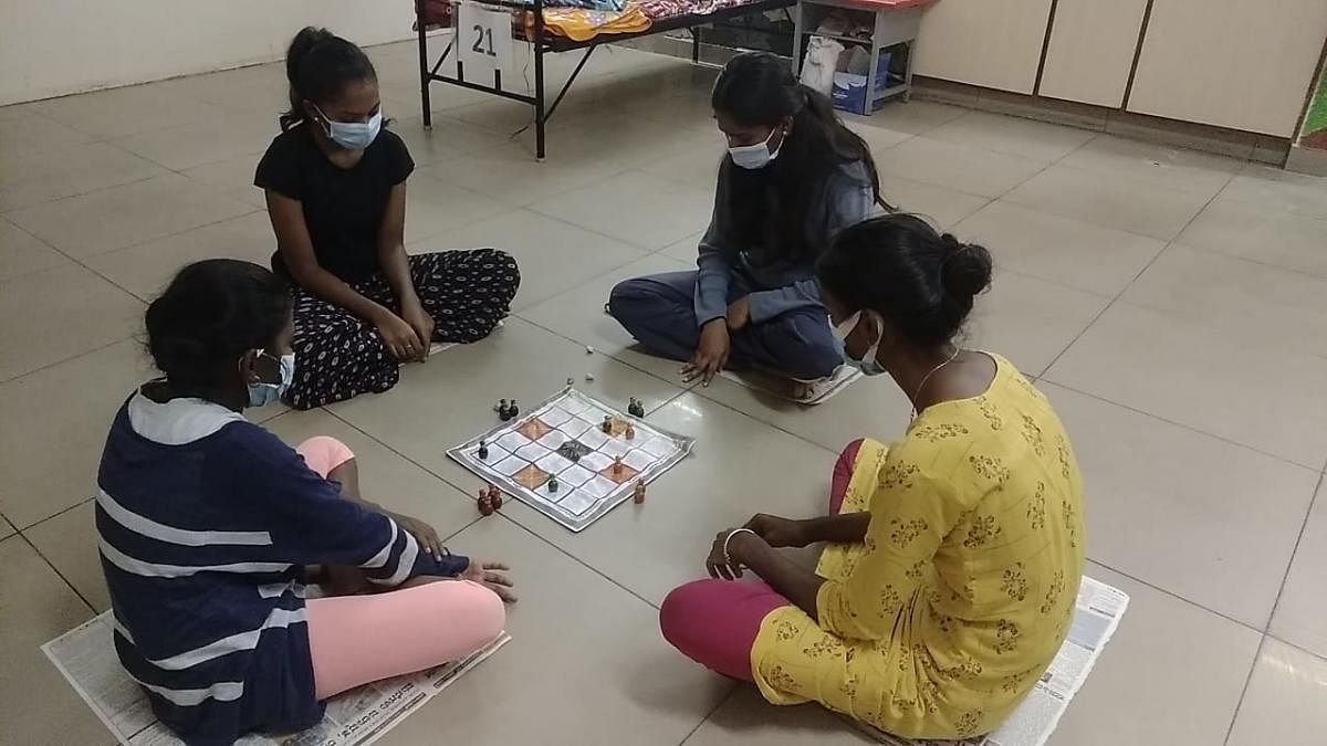 Covid patients play a traditional game at a Covid care centre in Bengaluru.