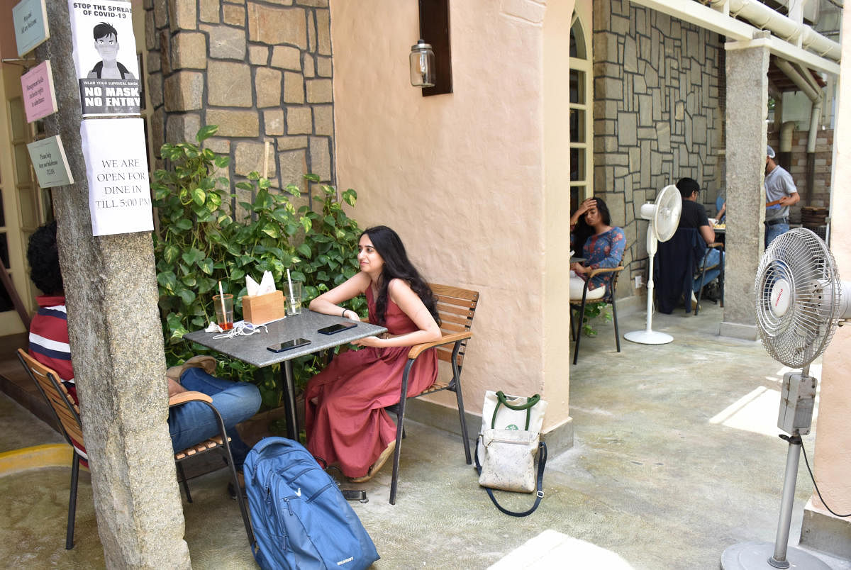 The joys of eating out... diners at a restaurant on Lavelle Road, Bengaluru. Credit: DH Photo/Janardhan B K