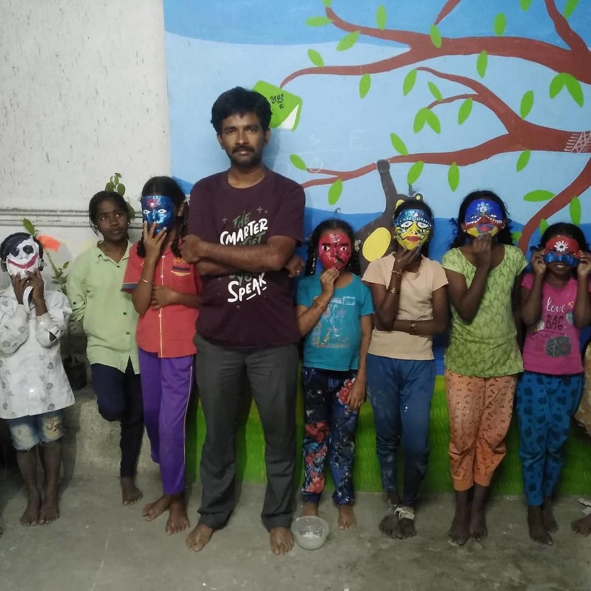 Children engage in a mask-making activity at the Haadibadi Community Library in Bengaluru. 