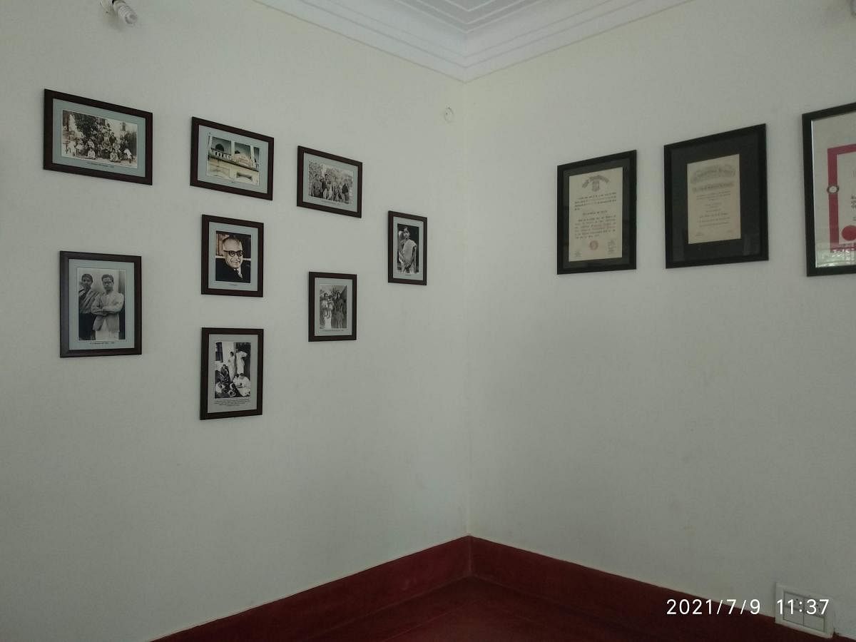 An array of photographs in the hall on the ground floor at R K Narayan’s house, now a museum. DH Photos/T R Sathish Kumar