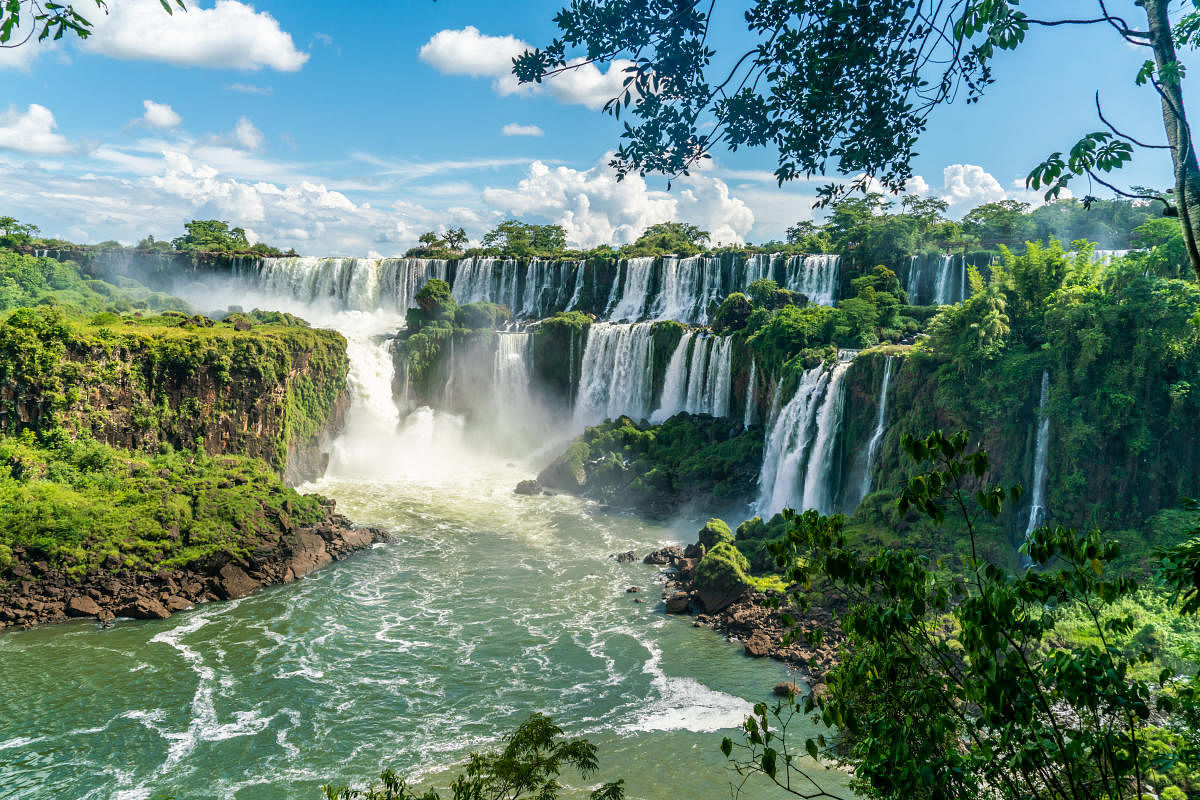 Iguazu Falls are in Argentina and Brazil and are also bordered by Paraguay