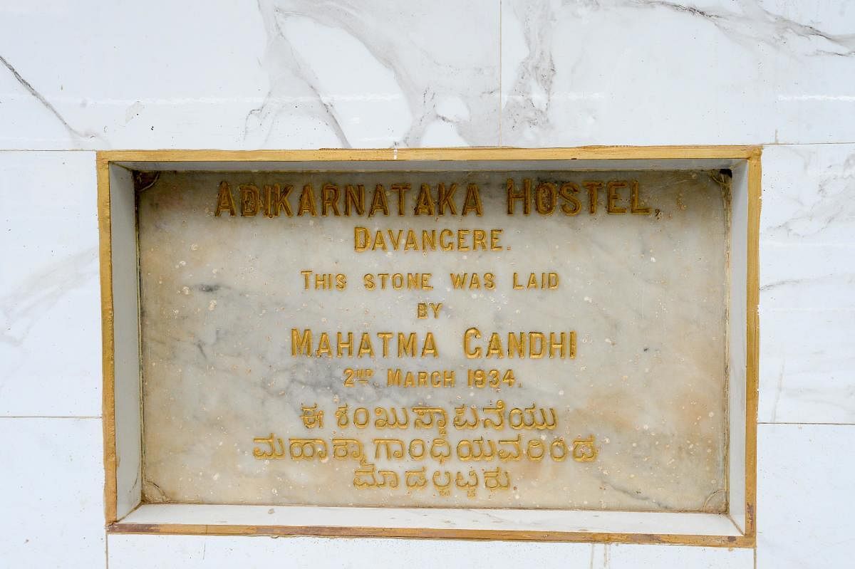 Plaque commemorating the foundation stone laid by Mahatma Gandhi.