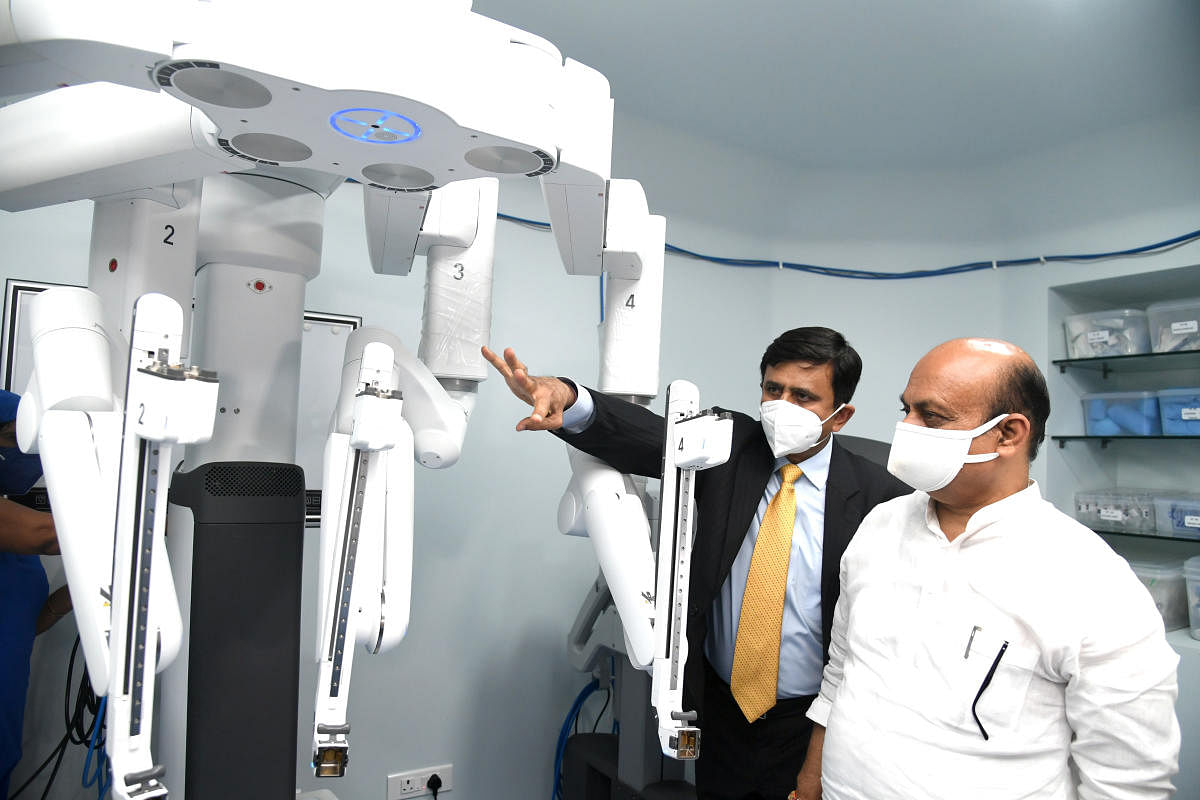 Dr C Ramachandra, Director KMIO explain function of Robotic Operation Theatre to Basavaraj Bommai, Chief Minister after inaugurated at Kidwai Memorial Institute of Oncology Cancer Research and Training Centre (KMIO) in Bengaluru on Monday, 23 August 2021.