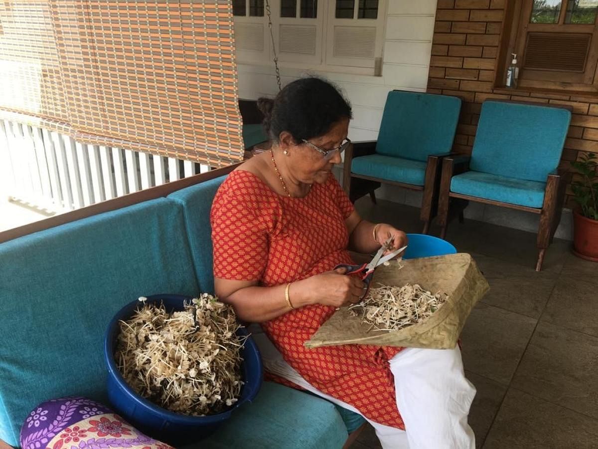 A woman preparing Kodagu delicacies. Photos by Arjun Bopanna, Niveditha Harish and Nisha Poovaiah