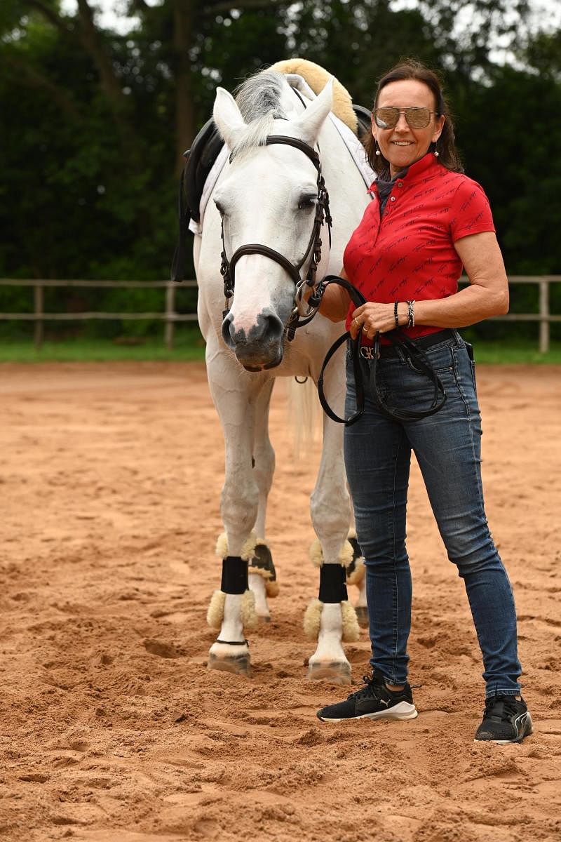 Jitu Virwani, Chairman and Managing Director of the Embassy Group and Silva Storai, director EIRS, with one of the 94 horses at the horse riding and equestrian training facility in Devanahalli, 27 km north of Bengaluru.