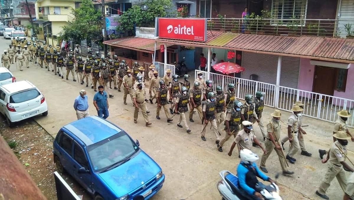 Police personnel take out a march past. DH Photos