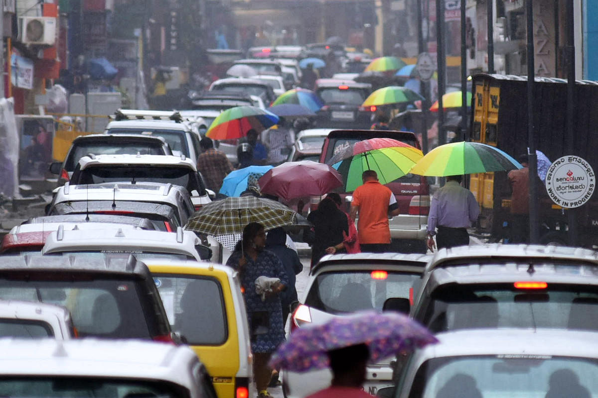 Traffic came to a standstill after the downpour at Commercial Street. DH PHOTO/PUSHKAR V