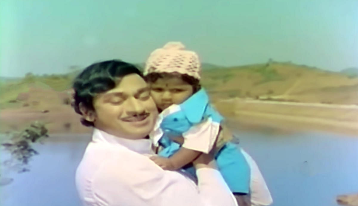 Puneeth as an infant in ‘Premada Kanike’ (1976).