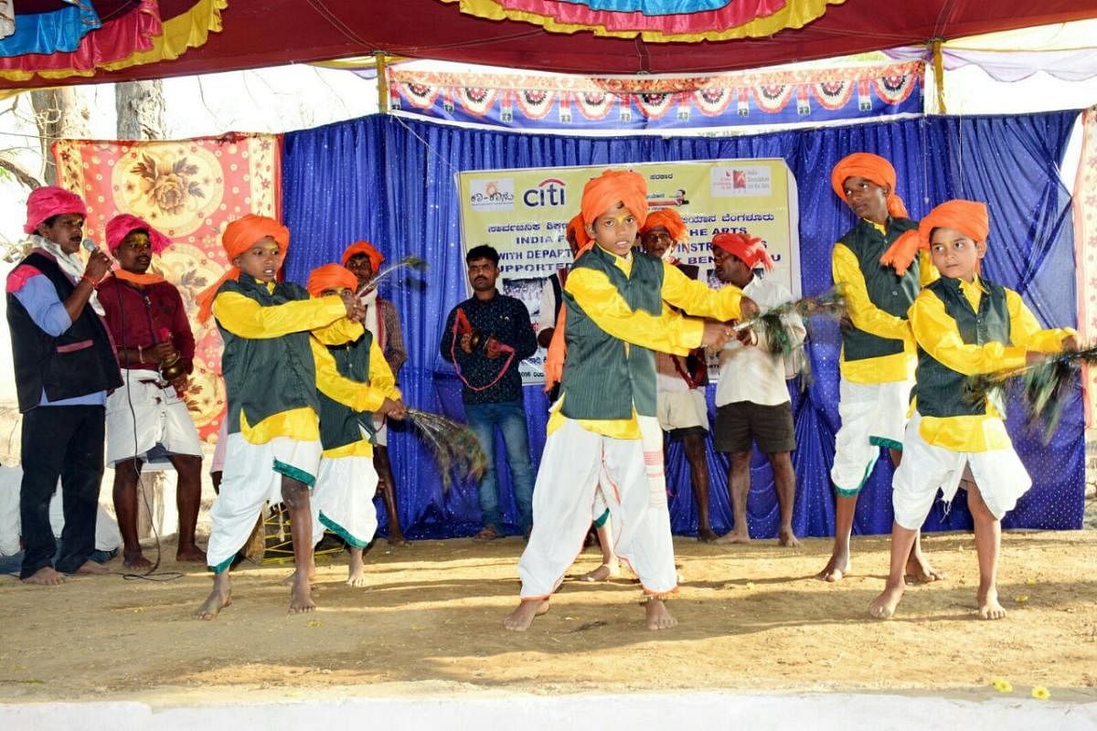 Students perform a traditional dance of the Gouli community at school.