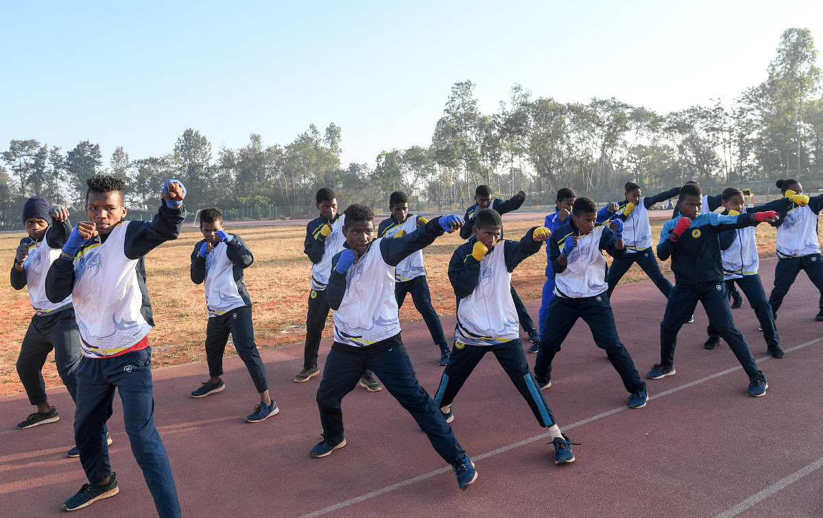 Siddi community children training at the Vidyanagar Sports Hostel under coach Dhanasanjay (not in picture). DH Photo/ B H Shivakumar