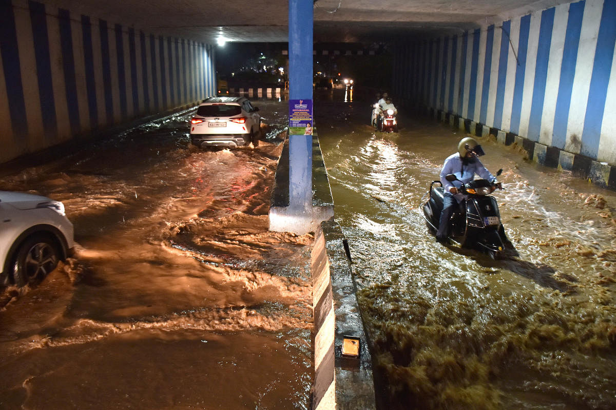 The underpass near the Cantonment Railway Station was submerged following a heavy downpour on Tuesday. DH PHOTO/B K Janardhan