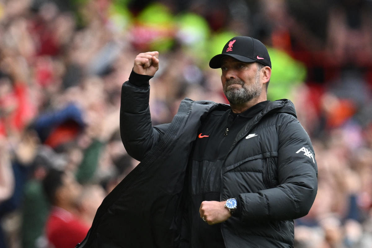 Liverpool's German manager Jurgen Klopp celebrates after Liverpool's Senegalese striker Sadio Mane scored his team first goal during the English Premier League football match between Liverpool and Wolverhampton Wanderers at Anfield in Liverpool, north west England on May 22, 2022. Credit: AFP Photo