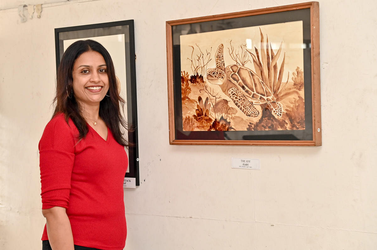 Jane Noronha's coffee painting exhibition, at Prasad Art Gallery in Mangalore. DH Photo / Irshad Mahammad