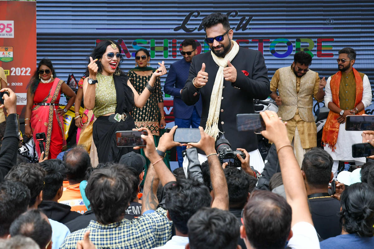 Bikers take part in a fashion show as part of the event.