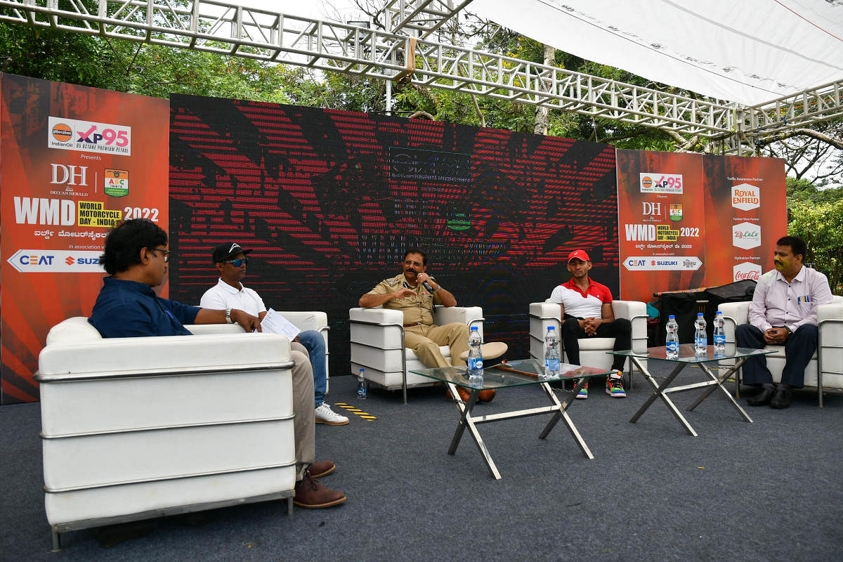 (L-R) Biker Rajini Krishnan, Joint Commissioner of Police, Traffic, Ravikanthe Gowda, racer Hemanth Mudappa and Central Crime Branch (CCB) Police Inspector Anil Kumar take part in a panel discussion.