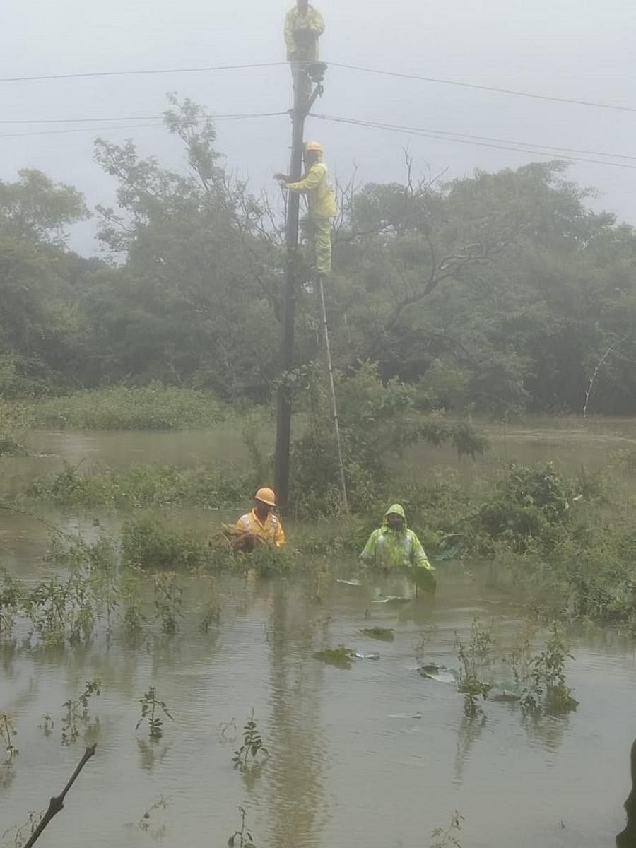 Officials repair an electricity pole at Betoli.