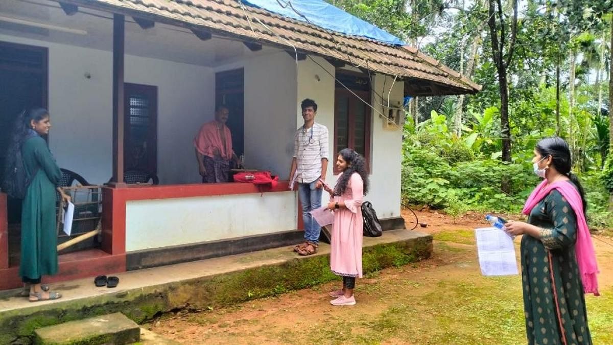 Student volunteers visit homes in Chakkittapara in Kerala’s Kozhikode district. Credit: Special Arrangement
