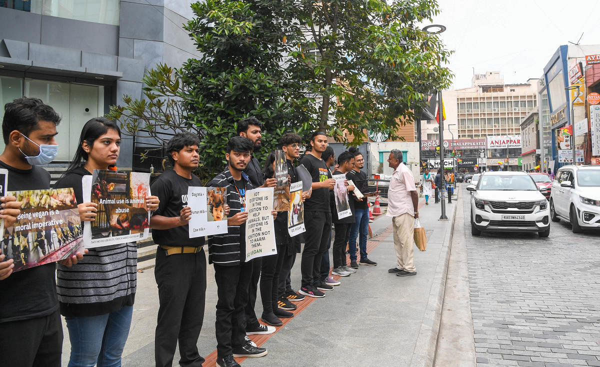 Members of Bengaluru Brigade for Animal Liberation (BBAL) held a demonstration at Church Street on Tuesday. DH Photo/B H Shivakumar