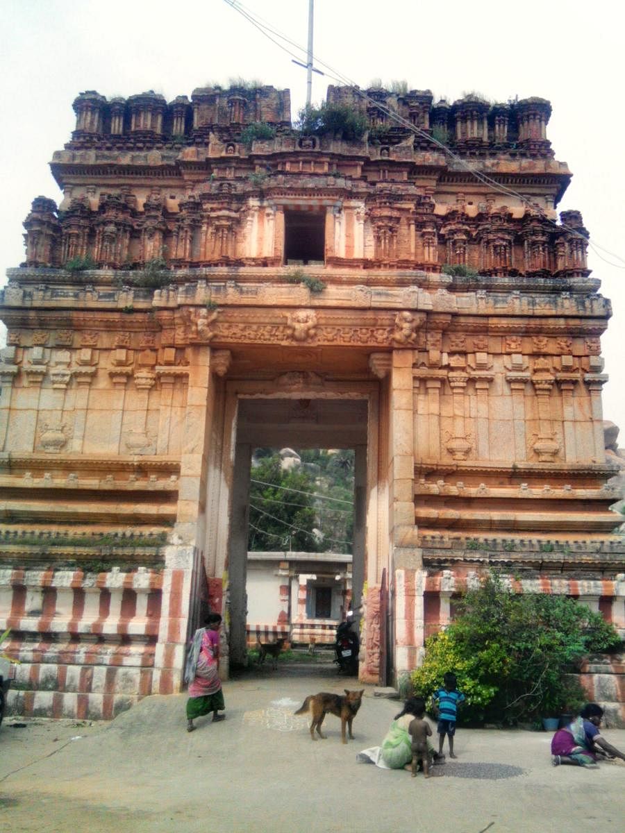 The gopura at the temple entrance, with intricate columns and slabs.