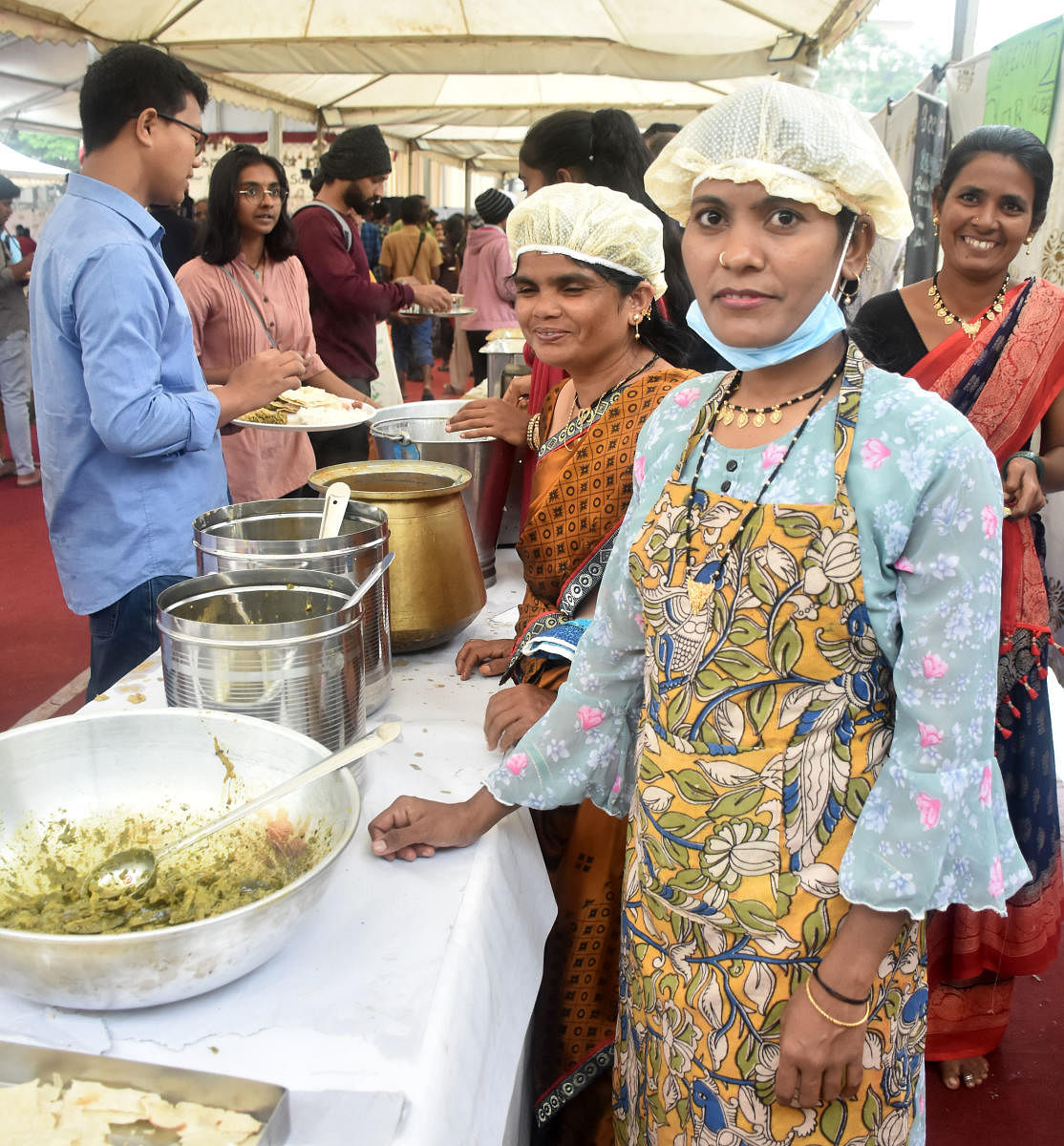 Bibi Jan, with women from her self-help group at their stall at Kisan Swaraj Sammelan. 