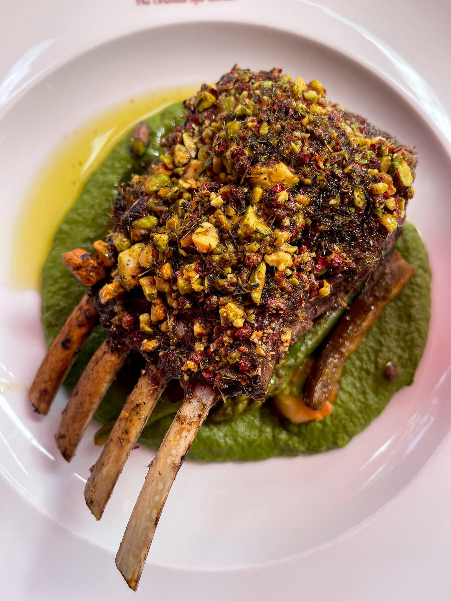 Pistachio crusted roast rack of lamb with sautéed spinach